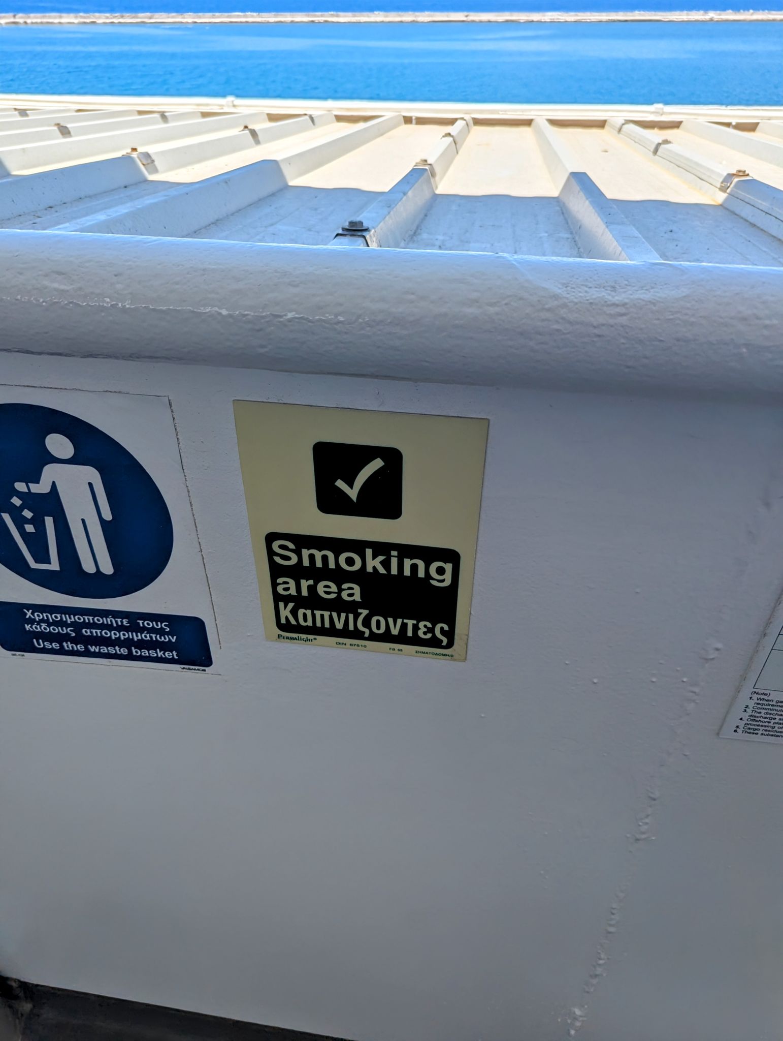 A sign that says "Smoking area" 